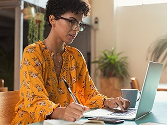 Student looking at her computer