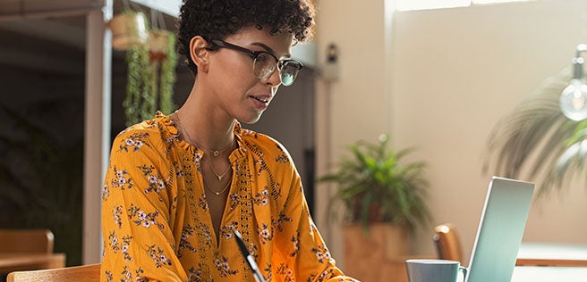 Student looking at her computer