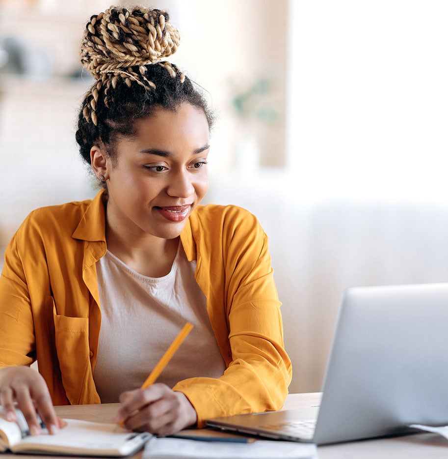 Girl looking at her computer