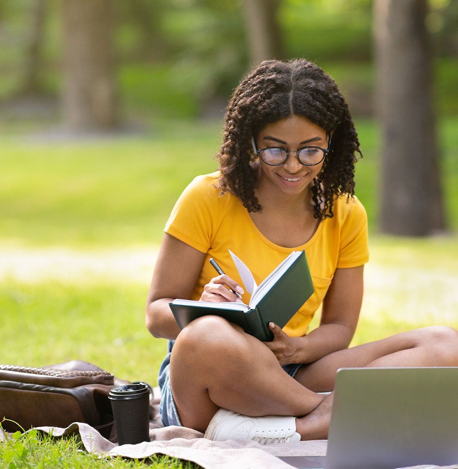 Girl studying outside