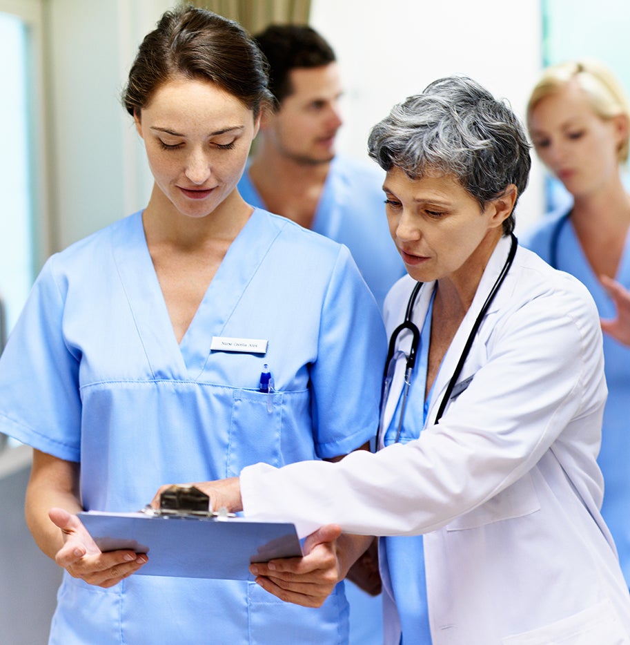 Doctor talking to a nurse