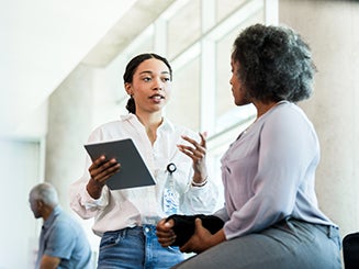 Two women talking