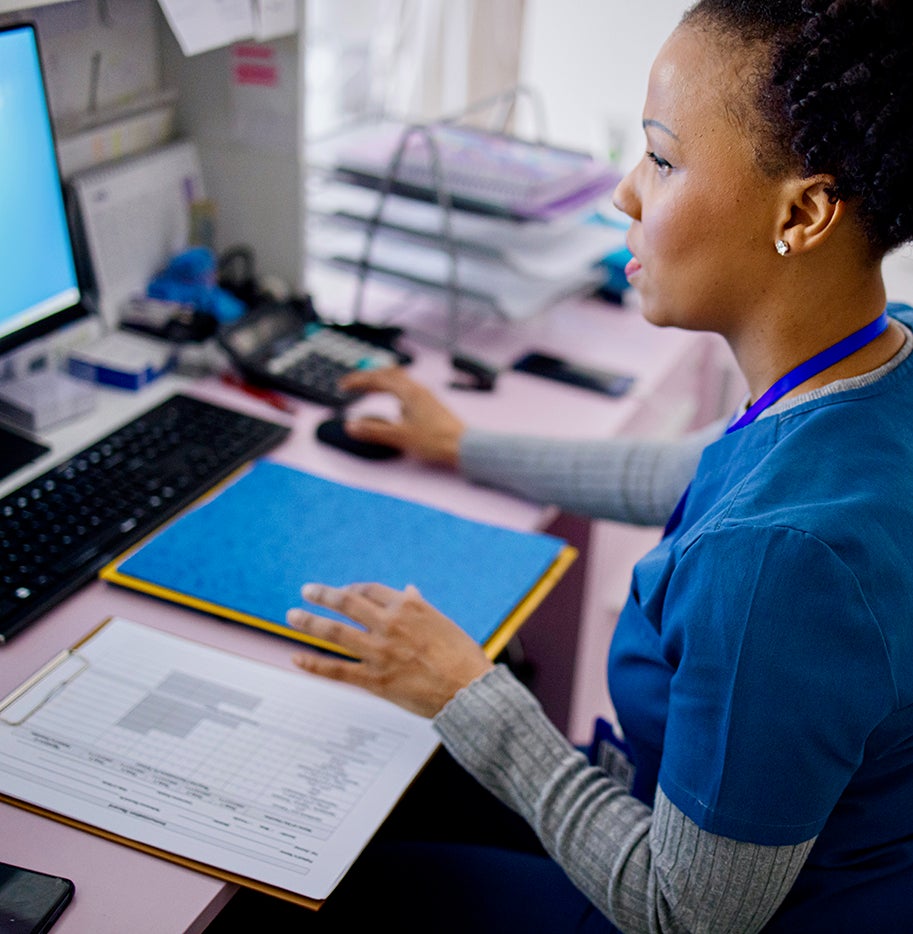 Nurse working on a computer