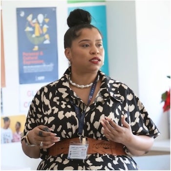 Shaina Bryant in front of the room teaching